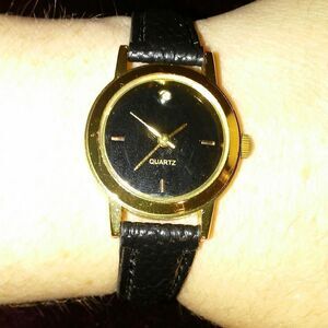 SKC black and gold ladies watch